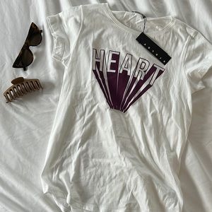 Brand new with tags. Size sm , sisley "heart" tee